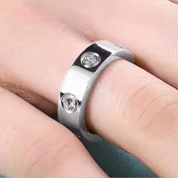 Jewelry - 2/$60 NWOT SS with CZ Ring sz 7